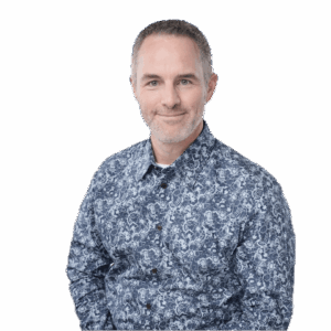 Ryan Soper-Powell, CX Friction Hunter, facing camera wearing blue patterned shirt. Headshot against clear white background.